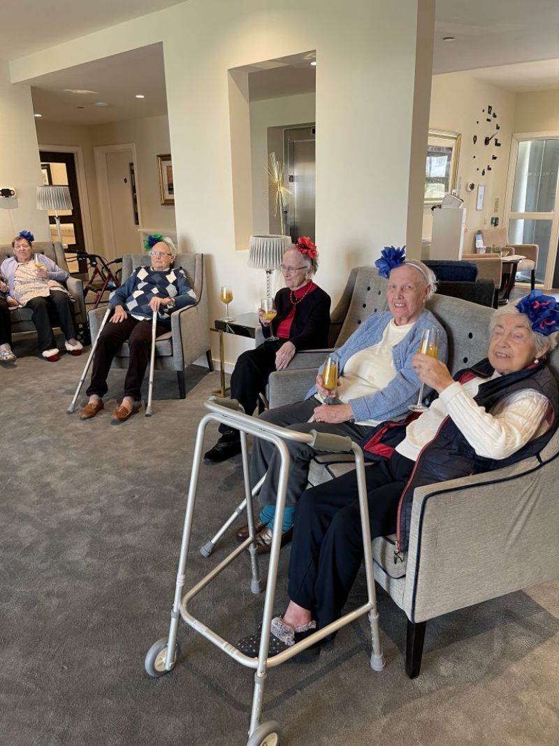 Residents Enjoying a Drink Together at Christmas