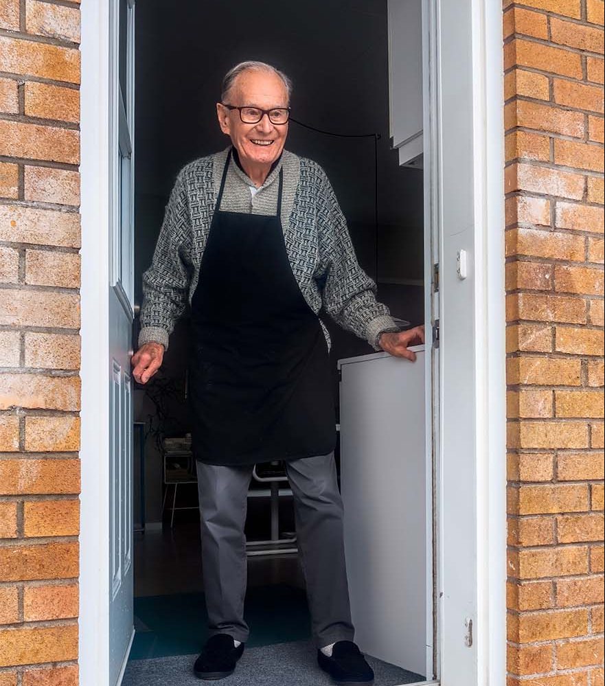 Elderly gentleman in doorway