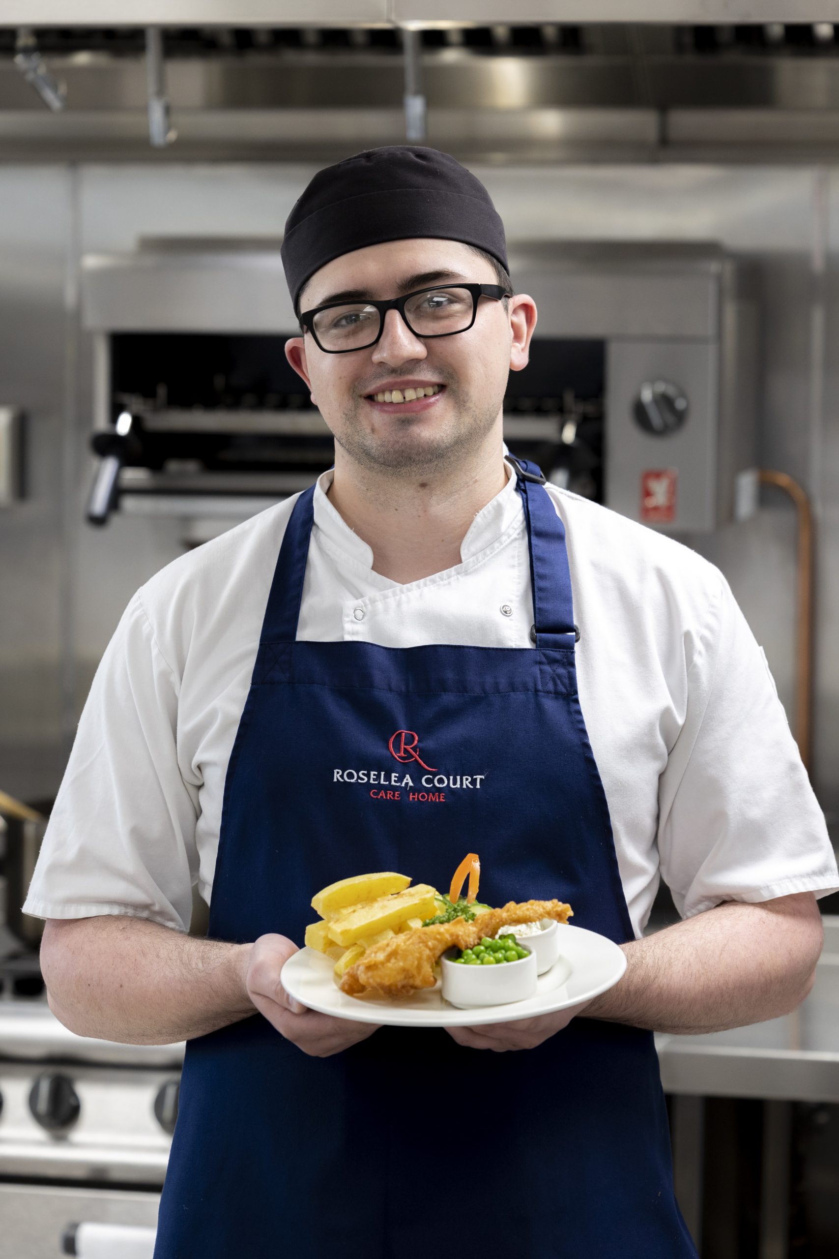 Chef Holding Fish & Chips