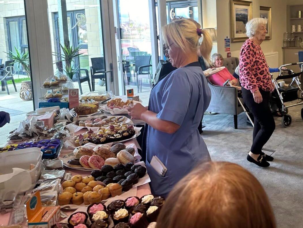 residents enjoying treats in the dining room