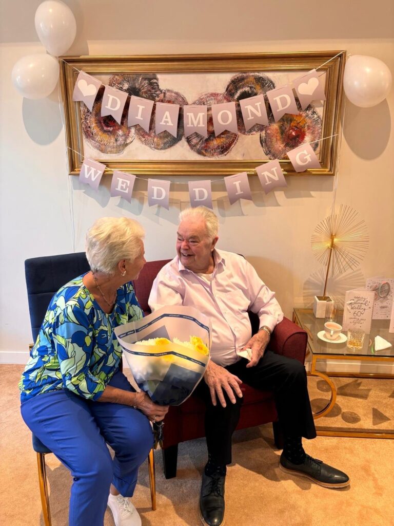 Mr and Mrs Jarvie celebrating their 60th wedding anniversary at Roselea Care Home with staff and residents